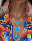 Turquoise Heart Pendant layered with other pendants