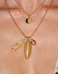 Carnelian Cowrie Pendant on necklace with other charms