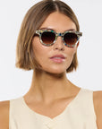 Devon Granita Sunglasses on model with average oval face shape