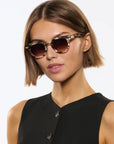 Devon Sunglasses in Plume on model with average, oval face shape