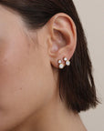 Diamond Hexagon Drop Earrings on ear