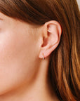 Pave Huggie Hoops on model