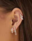 Single Diamond Teardrop Fringe Earring on ear in second hole