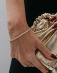 tennis bracelet on wrist