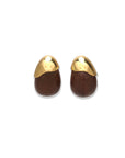 wood toro earrings on white background