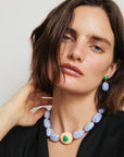 model wearing the andalusia collar necklace with a black top on a white background