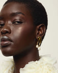 Sculptra Earrings on model