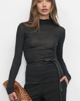 Astra High Neck Long Sleeve Sheer Knit Top front, with bag and belt