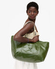 Grande Bateau Tote side view worn on model's shoulder