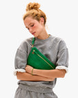 Grande Fanny Grass Woven Checker held against chest