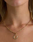 Groovy Turquoise Horseshoe Hinged Charm on chain on model
