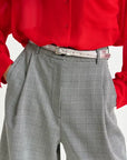 Ilida Shiny Thin Belt Silver with checkered pants