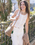 Leather Weave Braid Bucket Bag on shoulder with tulip charm