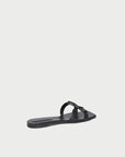 Black sandal on a light gray background, side/back