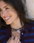 Woman wearing a striped shirt with Angora Necklace