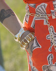 Stretch bracelet with gold bracelet
