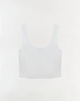 White sleeveless top on a light gray background