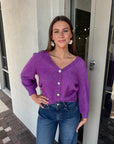 Pollen Reversible Sweater front view, buttons in front