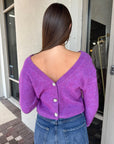 Pollen Reversible Sweater back view, button in back
