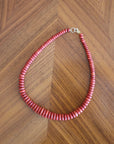 Graduated Coral Gemstone Necklace flay lay on wooden table