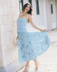 Clarke Dress, model holding out the skirt
