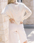 Grandella Sweater Ecru and The Half-Pipe Bermuda Fray Peach Puree back