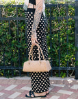 Devon Suede Shoulder Bag held down at side