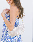 Clare V Lune Knot Woven Leather Bag on model