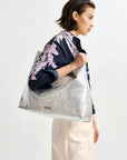 Istrala Silver Shopper Bag on model's shoulder