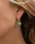 Isabel Green Dot Heart Earrings on ear
