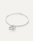 Silver heart-shaped pendant on a white background