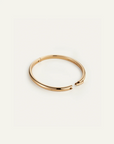 Gold bracelet on a white background