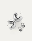 Gemma Hoops in Silver with backings taken off on white background