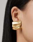 Sundra Earrings Gold on ear