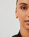 Small Nelle Hoop in Gold close up front view on model