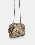 A snakeskin-patterned shoulder bag in beige, brown, and black, featuring a long thin strap, shown against a plain light gray background.