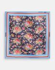Floral patterned square scarf with a blue border on a white background