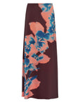 A long skirt in dark burgundy with a large abstract floral print in peach and blue, shown against a plain white background.