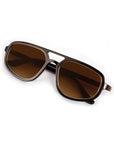 Aviator sunglasses with brown lenses on a white background