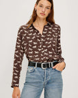 Woman modeling horse printed silk shirt front view