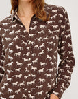 Woman modeling horse printed silk shirt front view