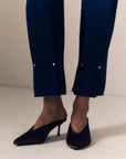 detail close up of pinched hem towards the bottom of the jean leg