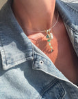 La Pez Chrysoprase Fish Bail on necklace with another charm next to it