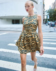 Layne Tiger Print Mini Dress on model walking across crosswalk