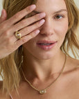 Groovy Diamond Evil Eye Big Bead on chain on model with matching ring