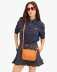 Midi Sac Natural Diagonal Woven worn as crossbody