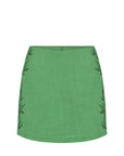 green mini skirt on white background
