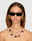 Moku Wrap front view on model with glasses on