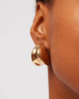 Paige Puff Earring closer up front view on model
