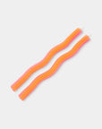 Two pink and orange striped earrings on a light gray background